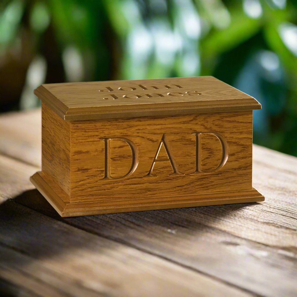 Traditional ashes casket with DAD engraved